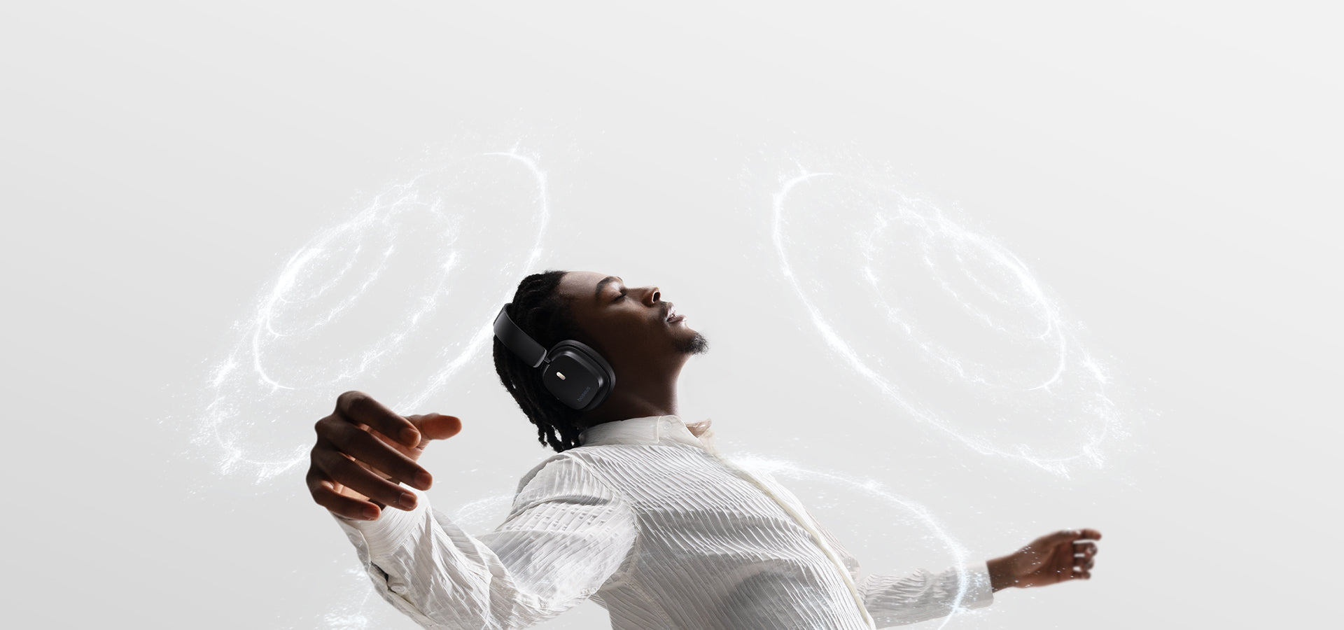 A man wearing black wireless headphone